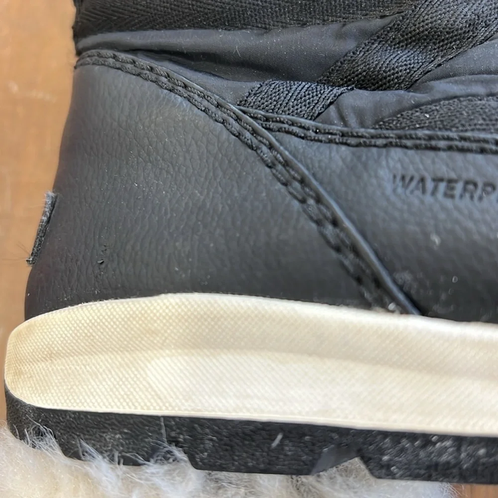 Sorel Whitney black faux fur winter boots
